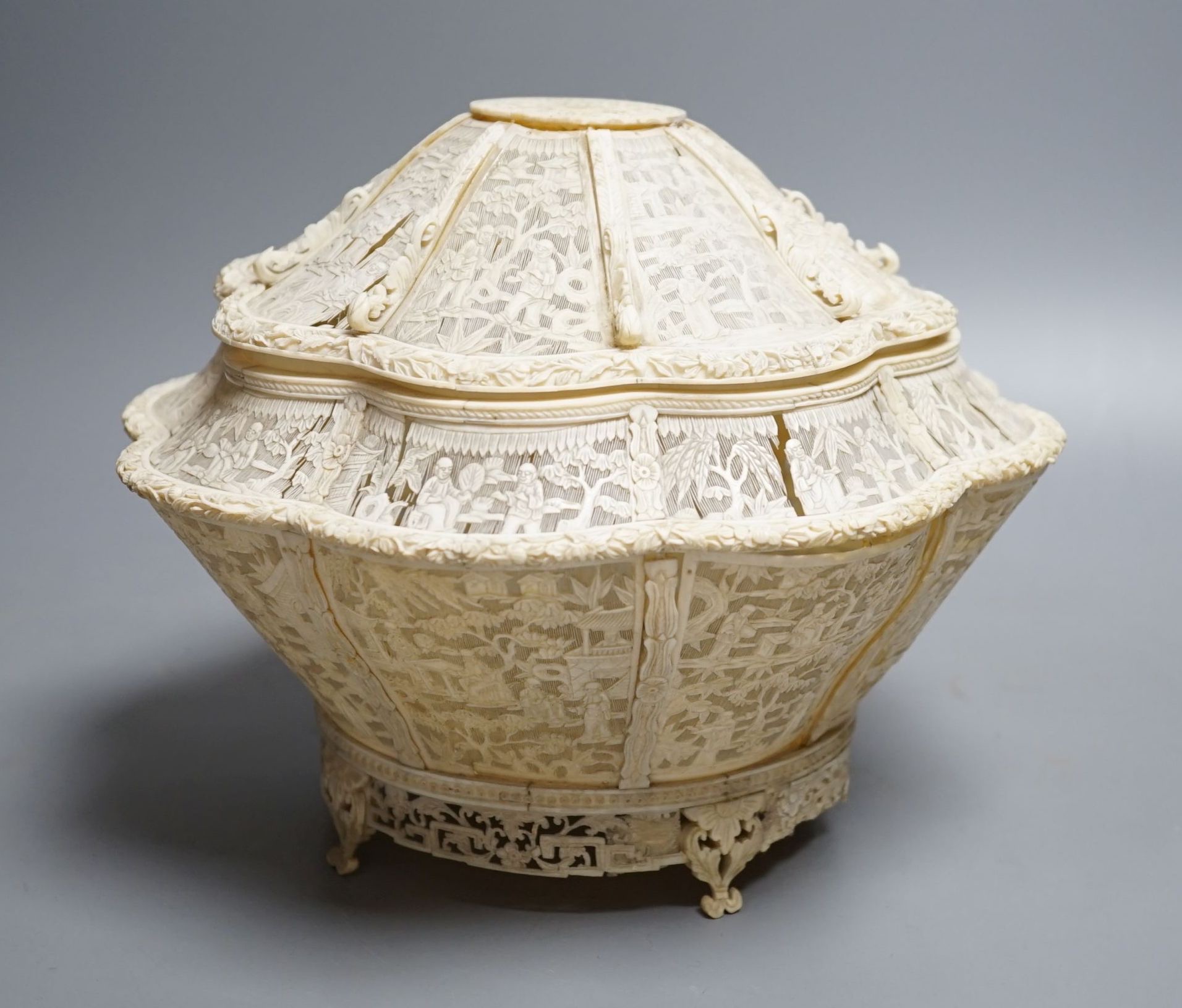 A Chinese finely pierced ivory lobed box and cover, circa 1800, 22cm